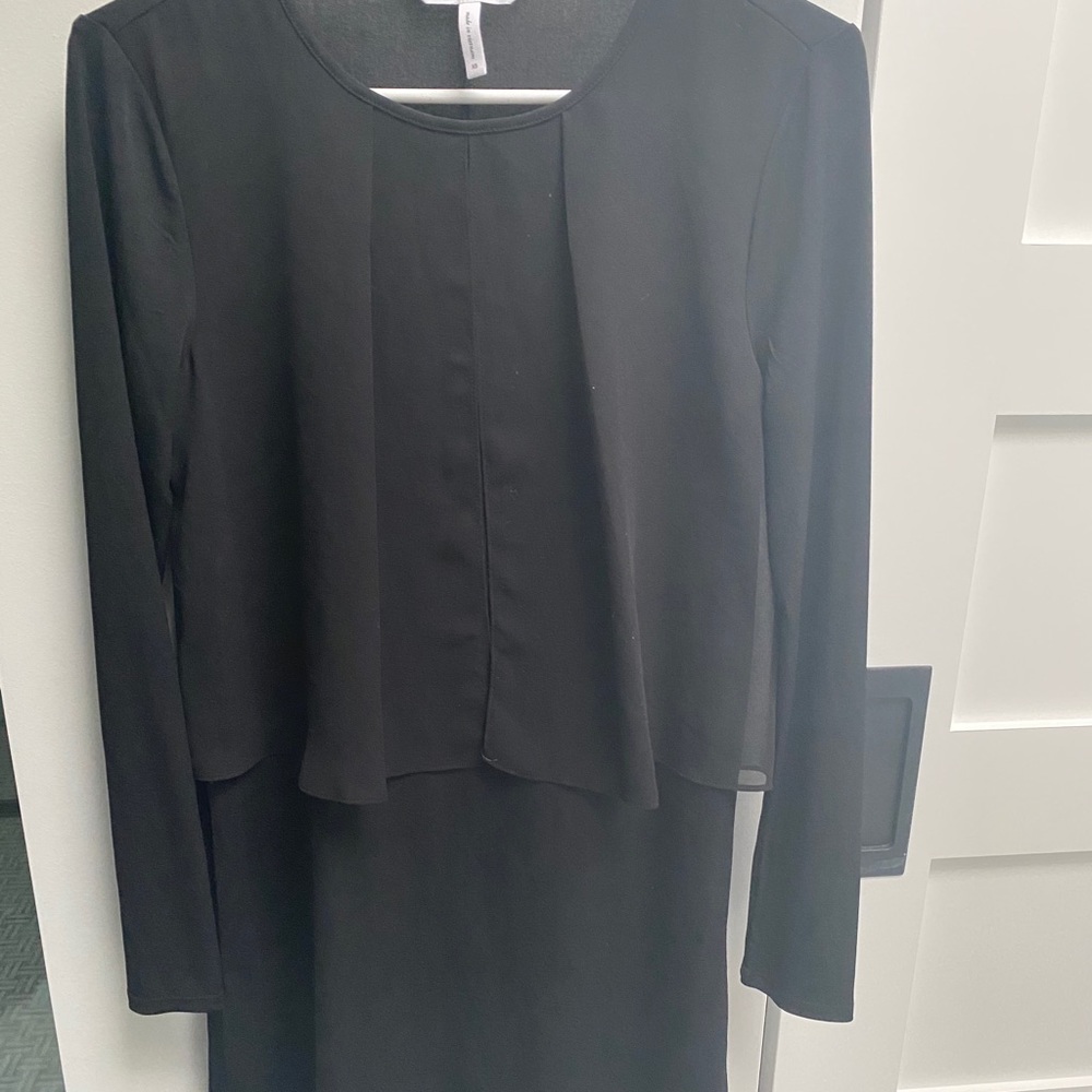 Black dress with front open drape detail